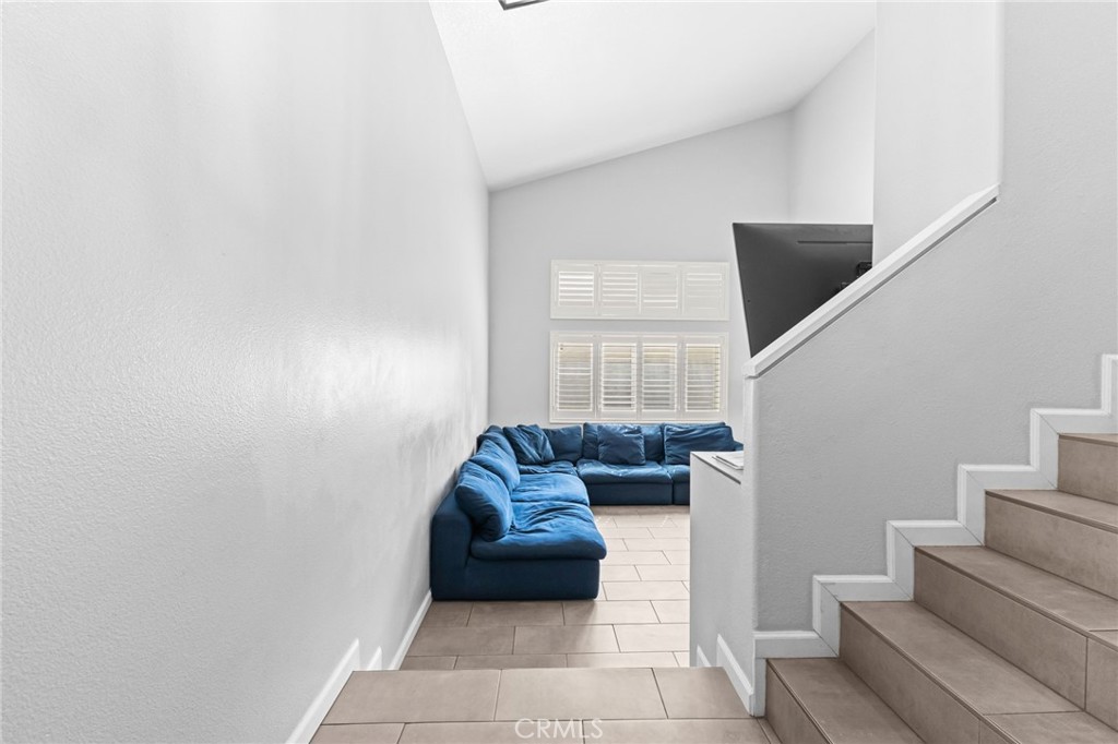 823 Pathfinder Way Corona, CA 92878 - Photo 5 of 59 a living room with furniture and a flat screen tv