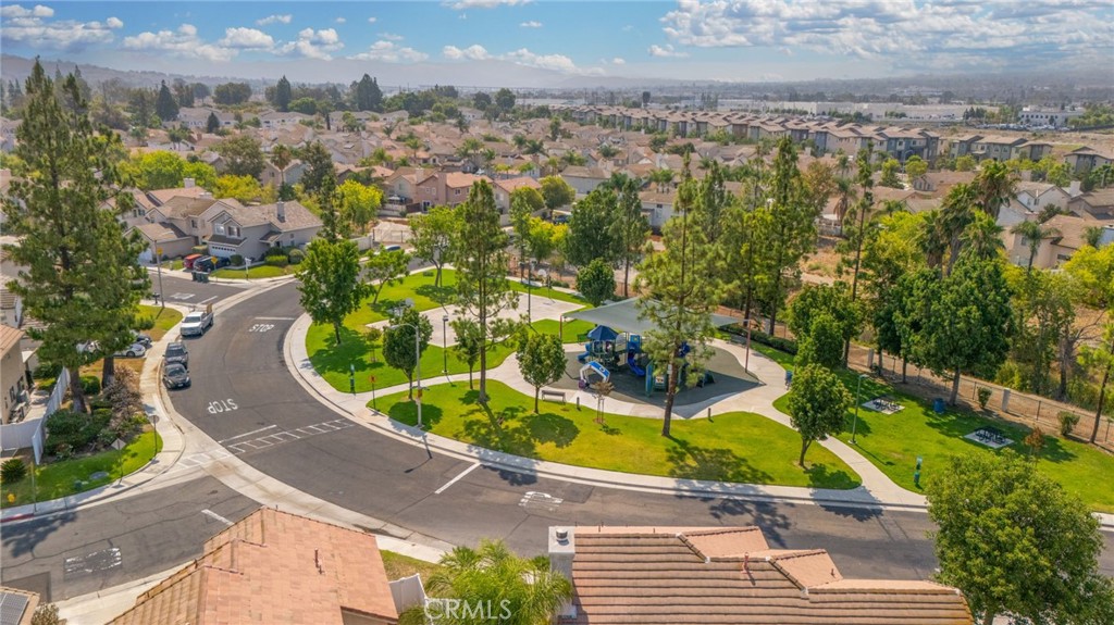 823 Pathfinder Way Corona, CA 92878 - Photo 57 of 59 an aerial view of a house with a swimming pool and lake view