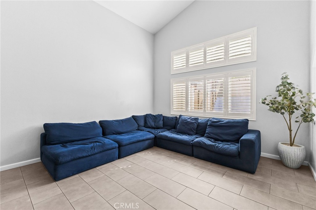 823 Pathfinder Way Corona, CA 92878 - Photo 9 of 59 a living room with furniture and a window