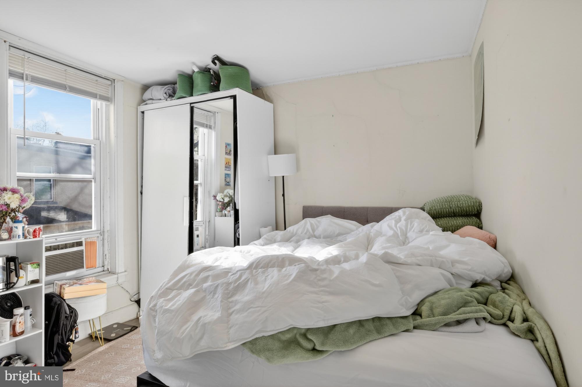 4058 Irving Street Philadelphia, PA 19104 - Photo 18 of 23 a bedroom with a bed and a window