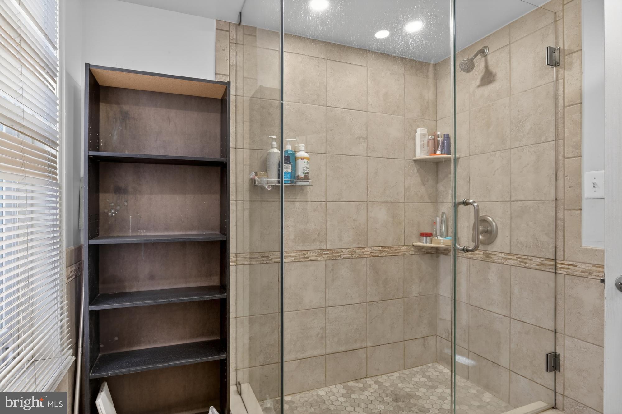 4058 Irving Street Philadelphia, PA 19104 - Photo 20 of 23 a bathroom with a shower