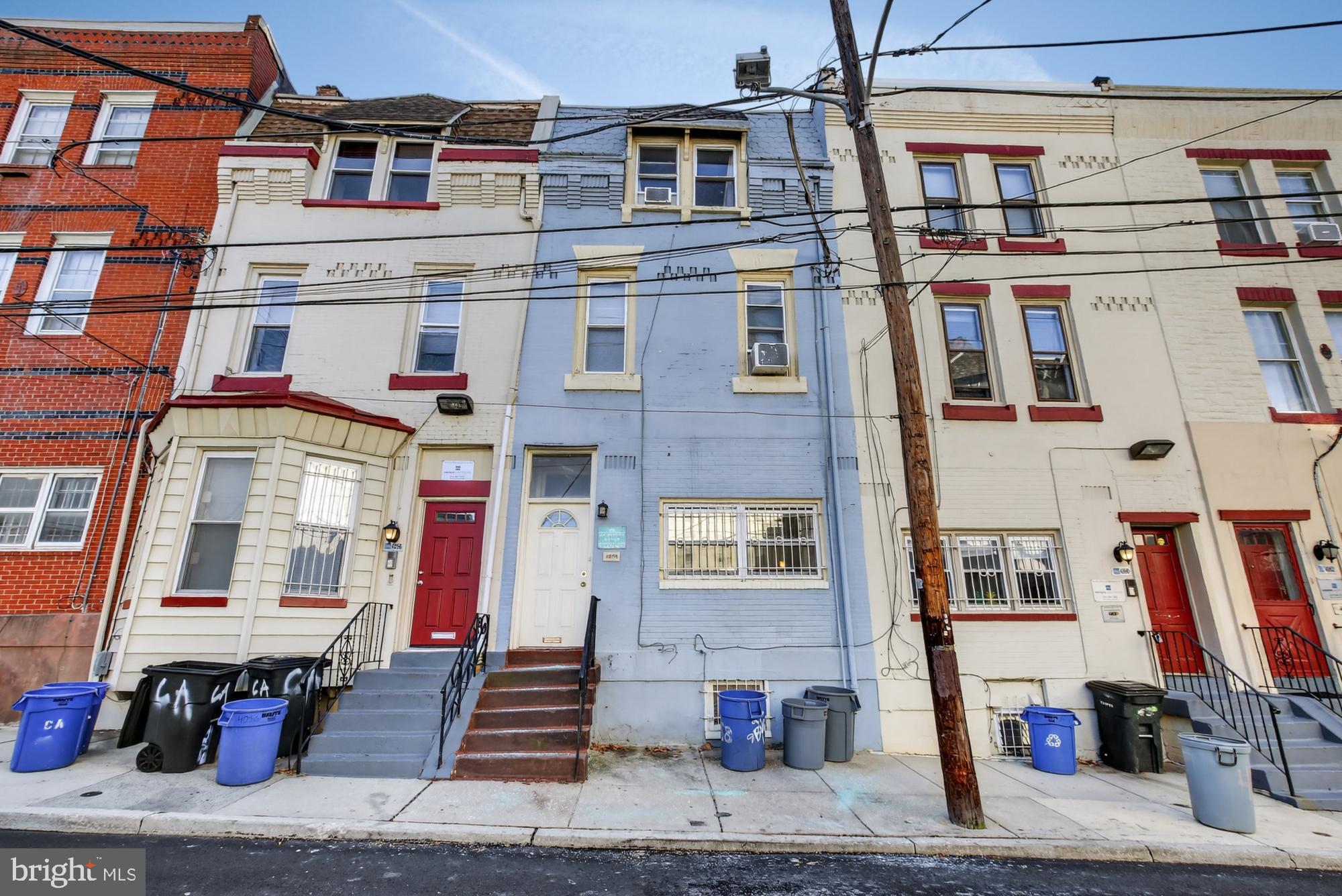 4058 Irving Street Philadelphia, PA 19104 - Photo 23 of 23 a front view of a building with many windows
