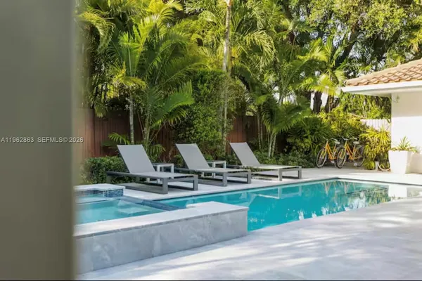 a view of a house with sitting area and tub