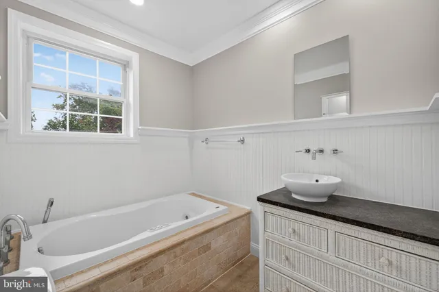 a view of a house with a yard porch and sitting area