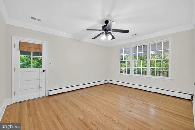 aerial view of a house with a yard