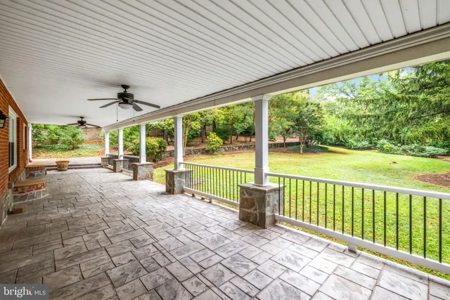 a kitchen with stainless steel appliances a refrigerator stove and microwave