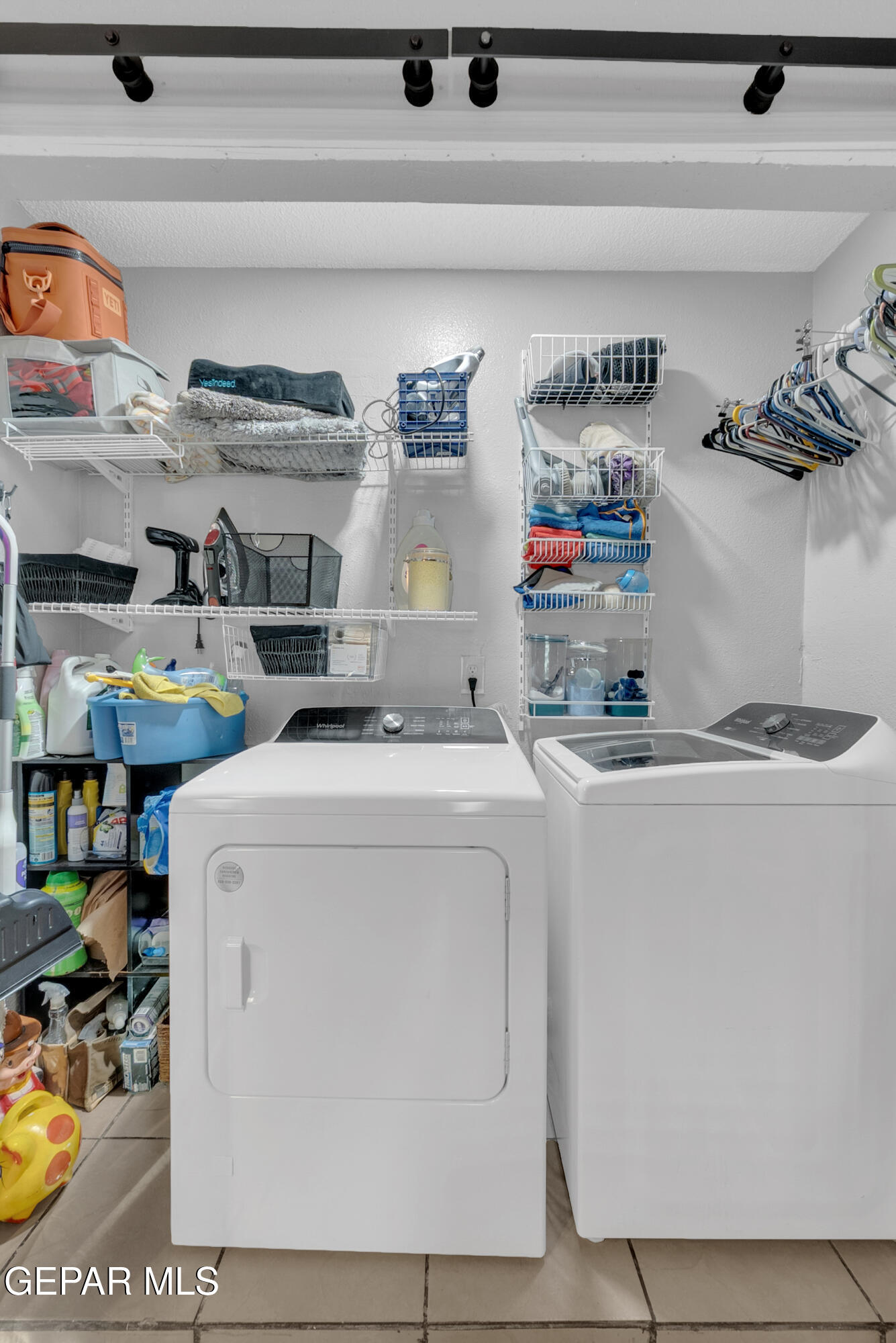 3444 Itasca Street El Paso, TX 79936 - Photo 26 of 88 a utility room with dryer and washer