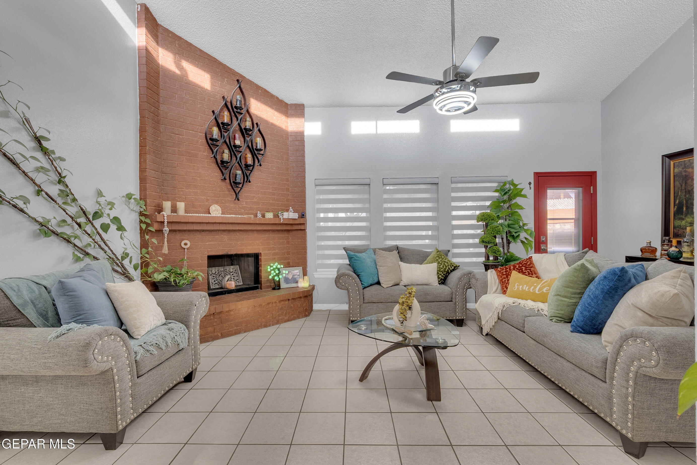 3444 Itasca Street El Paso, TX 79936 - Photo 27 of 88 a living room with furniture and a fireplace