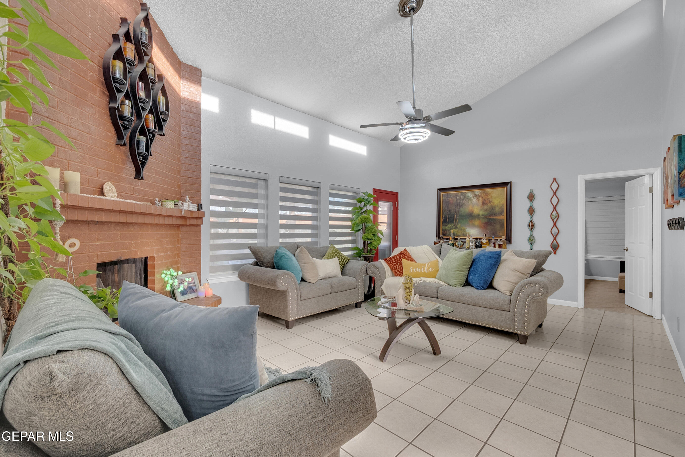 3444 Itasca Street El Paso, TX 79936 - Photo 28 of 88 a living room with furniture and a flat screen tv