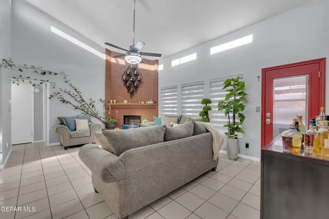 a bathroom with a sink vanity mirror and toilet