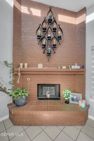 a bathroom with a toilet and a shower curtain