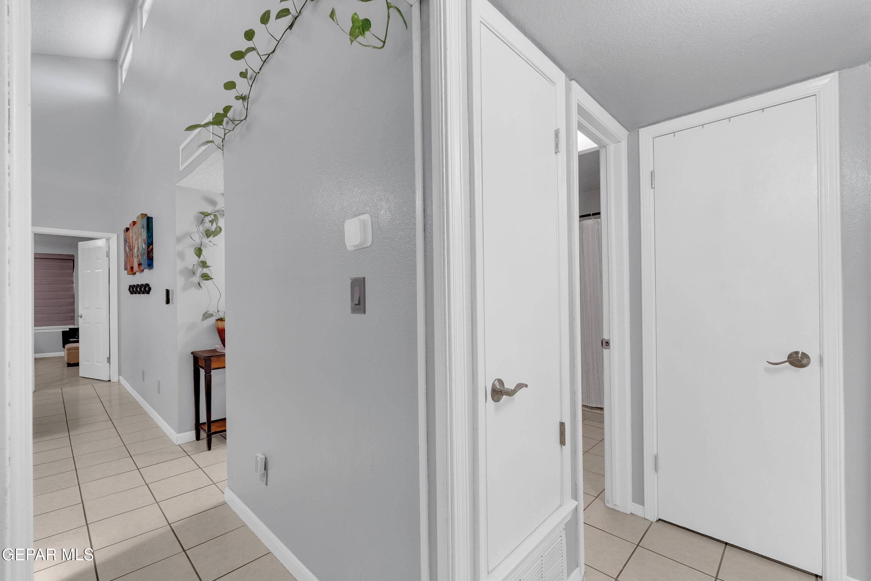 3444 Itasca Street El Paso, TX 79936 - Photo 32 of 88 a view of a hallway with closet and a window