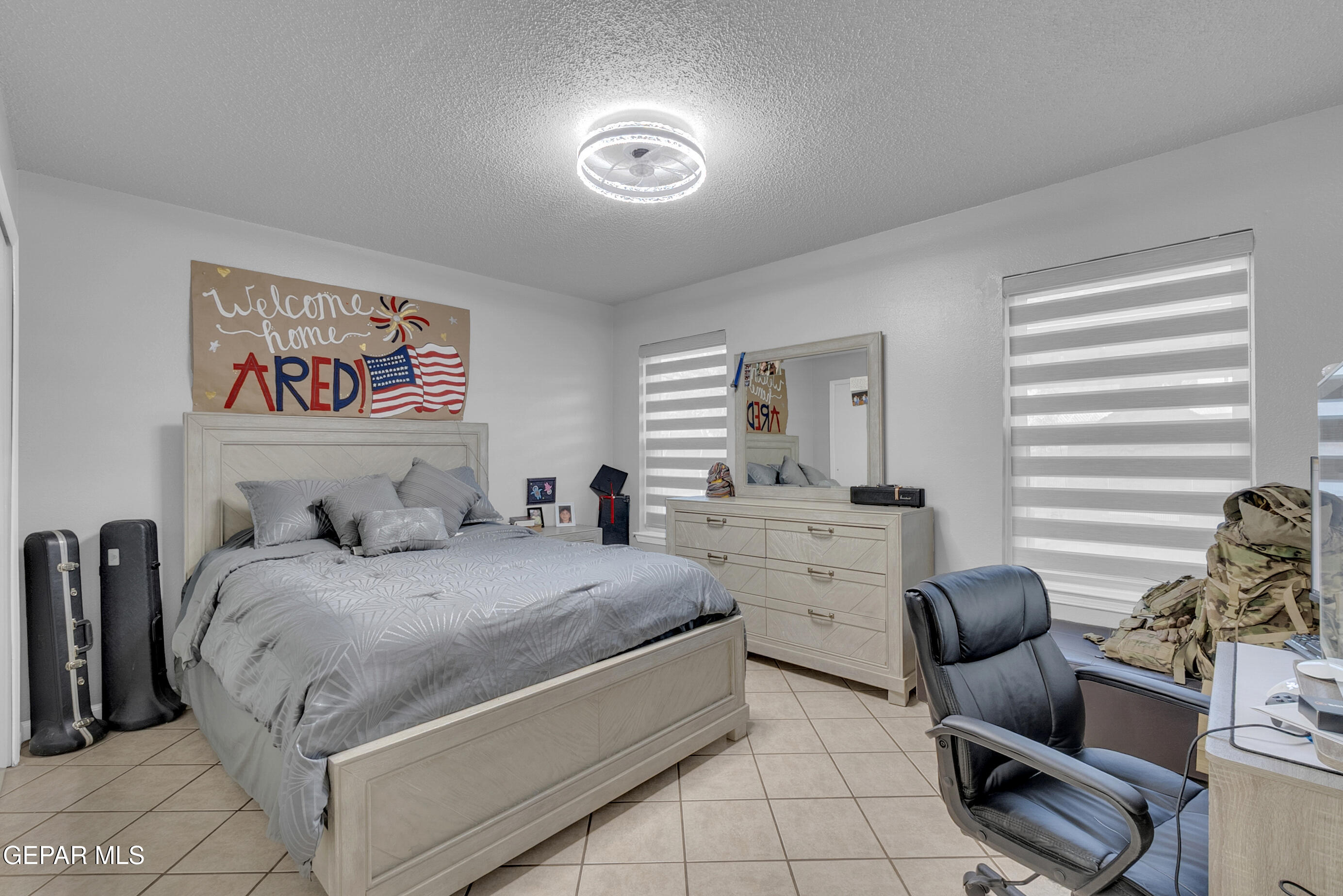 3444 Itasca Street El Paso, TX 79936 - Photo 37 of 88 a bedroom with a bed and furniture