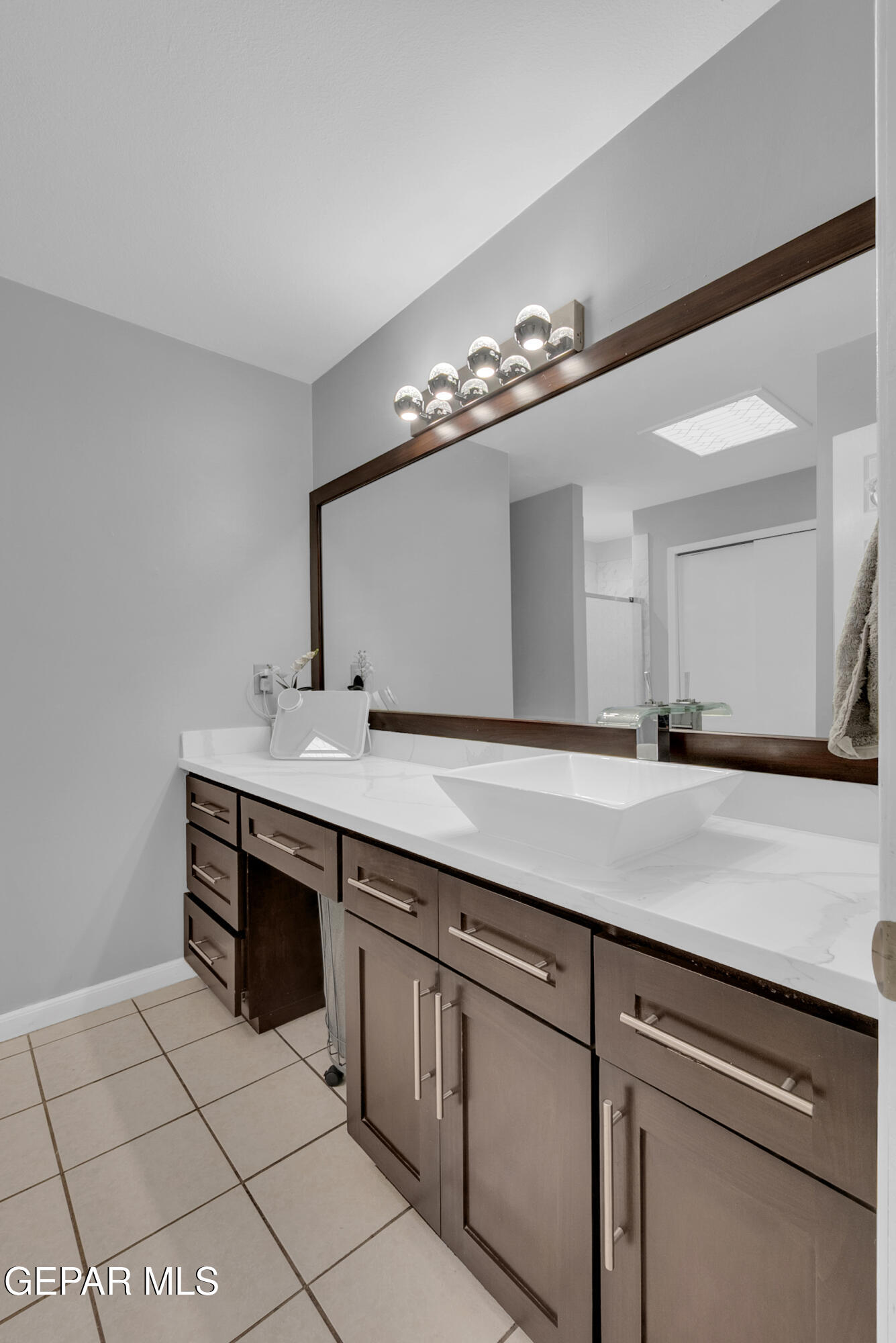 3444 Itasca Street El Paso, TX 79936 - Photo 47 of 88 a bathroom with a sink and a mirror