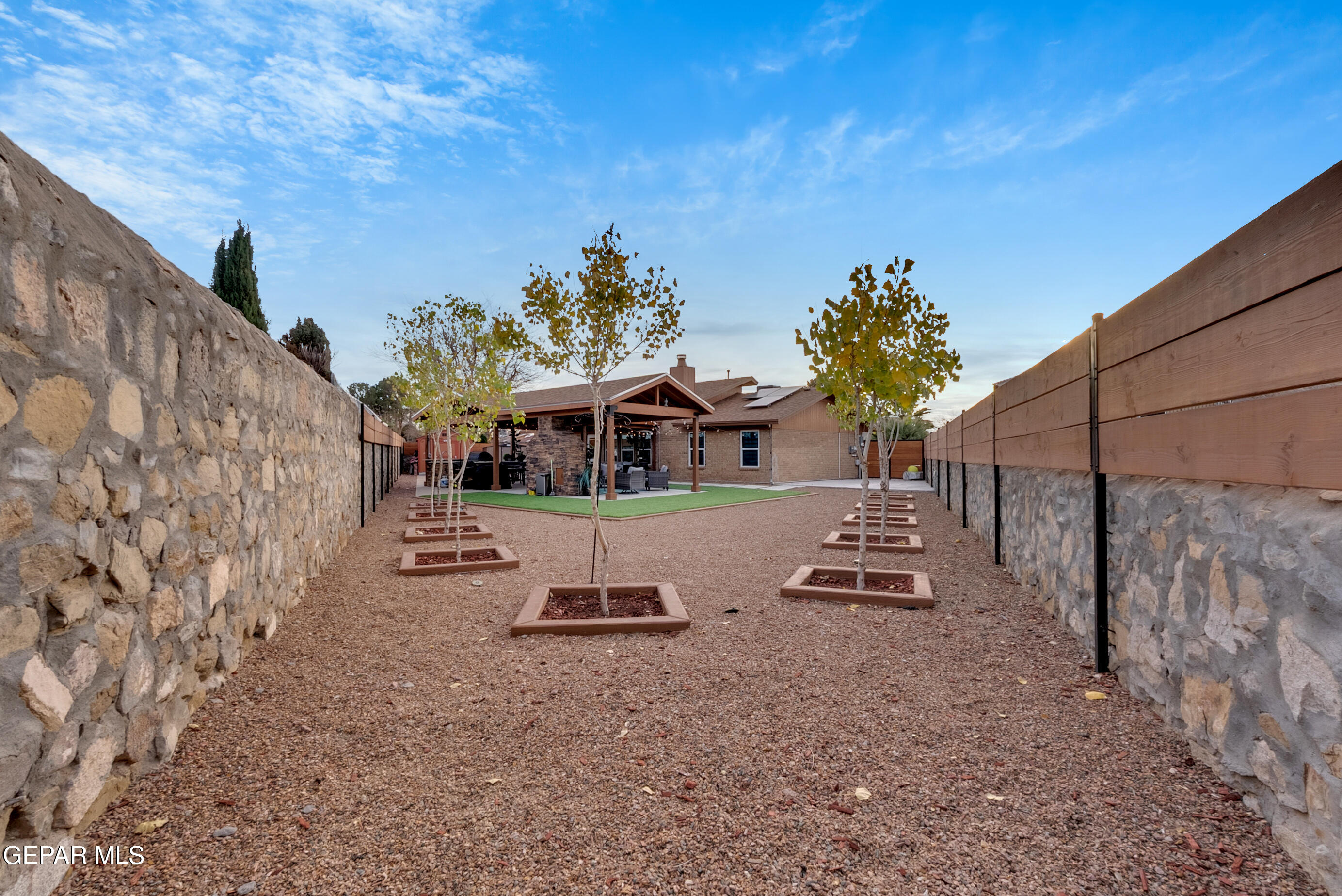 3444 Itasca Street El Paso, TX 79936 - Photo 73 of 88 a view of a house with a yard