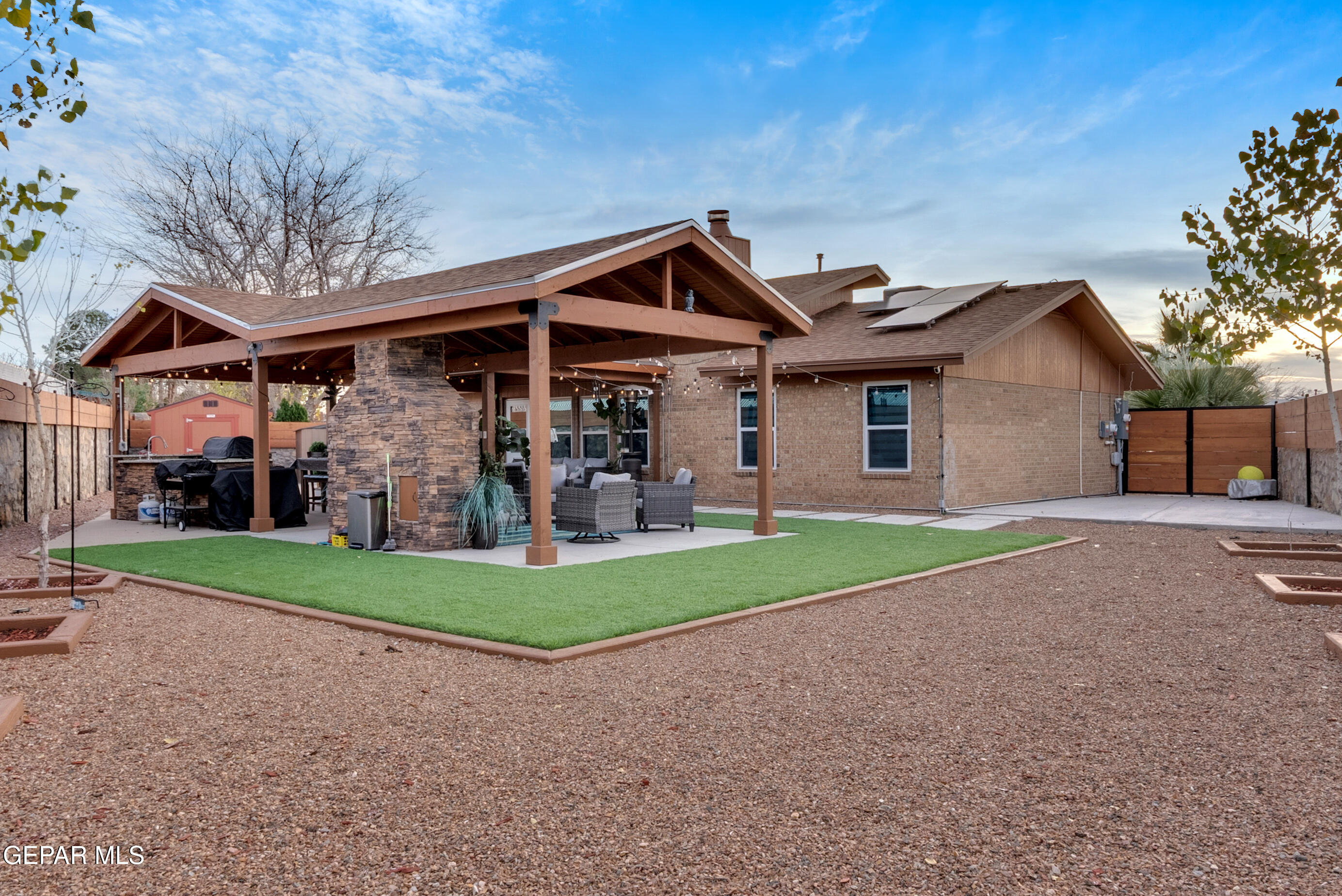 3444 Itasca Street El Paso, TX 79936 - Photo 75 of 88 a front view of a house with a yard and garage