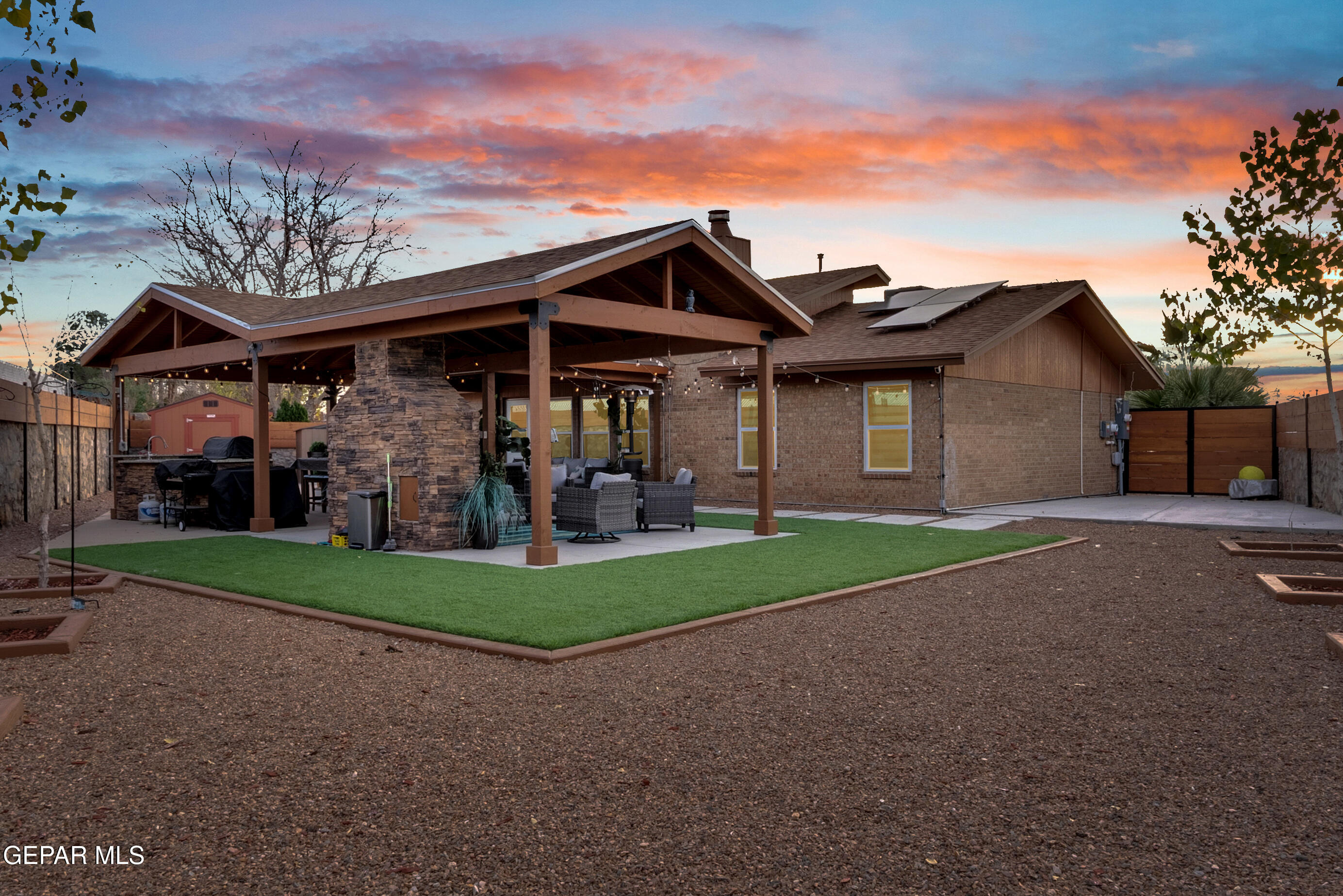 3444 Itasca Street El Paso, TX 79936 - Photo 76 of 88 a front view of a house with a yard and garage