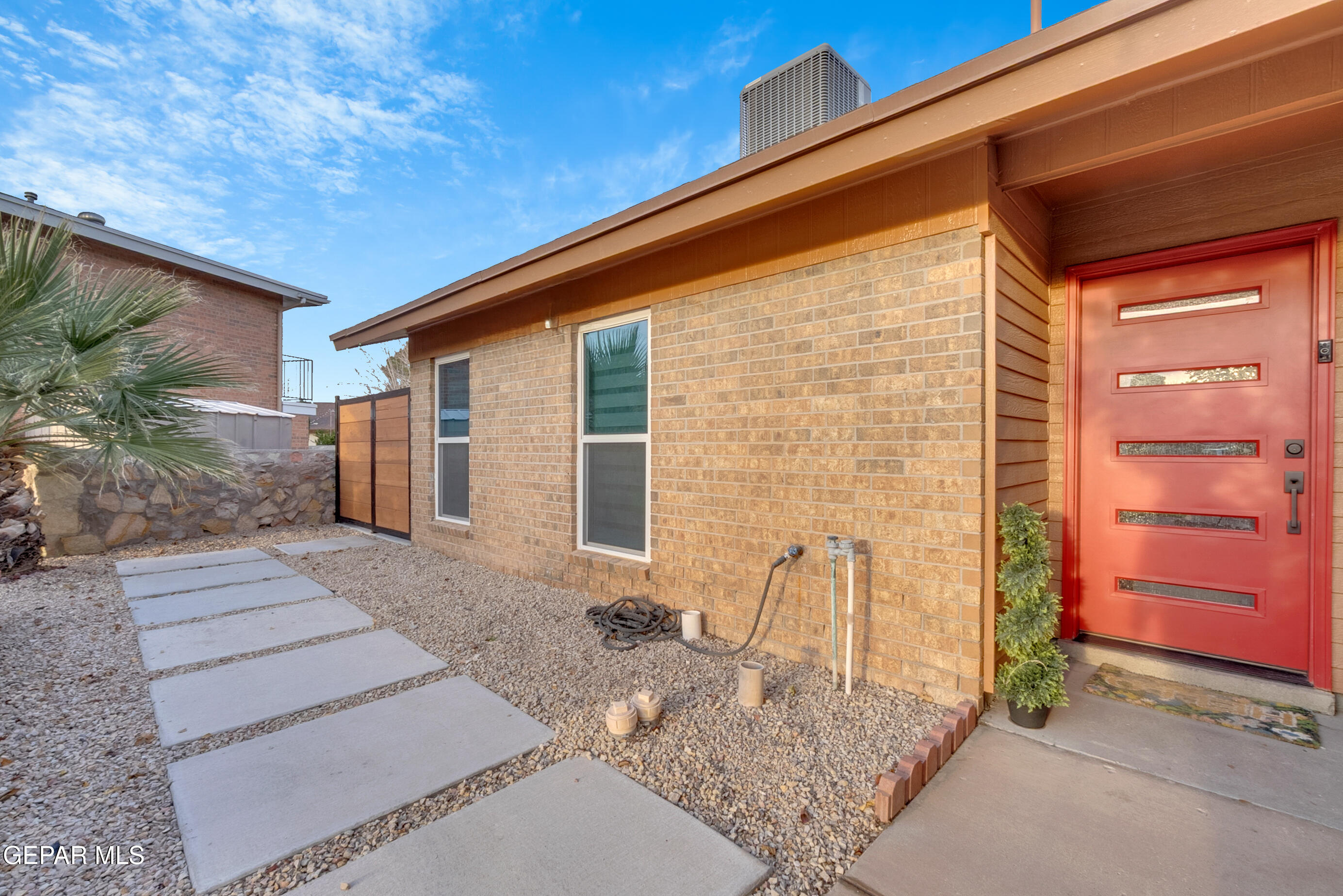 3444 Itasca Street El Paso, TX 79936 - Photo 8 of 88 a front view of a house with a yard