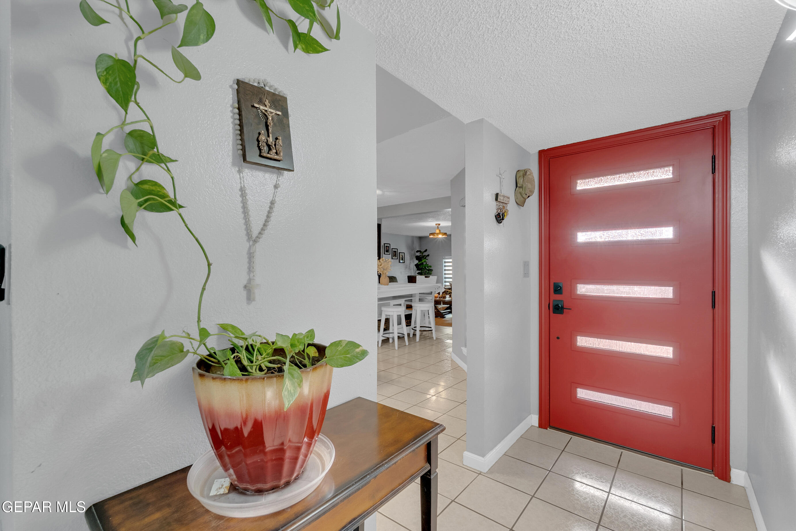 3444 Itasca Street El Paso, TX 79936 - Photo 9 of 88 a view of a vase of flowers sitting on a table