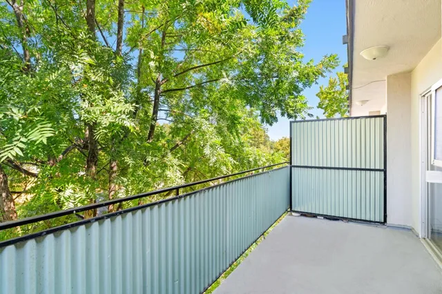 a view of a balcony with an outdoor space