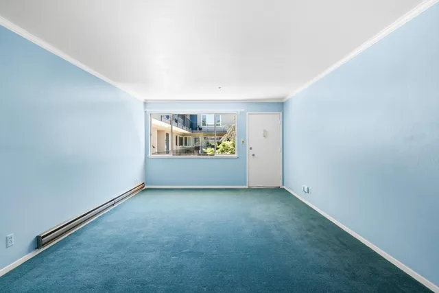 an empty room with windows