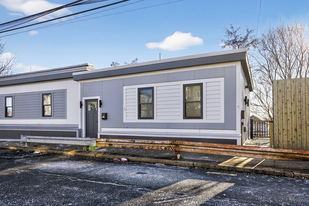 3 Walley Street Boston, MA 02128 - Photo 4 of 11 a front view of a house