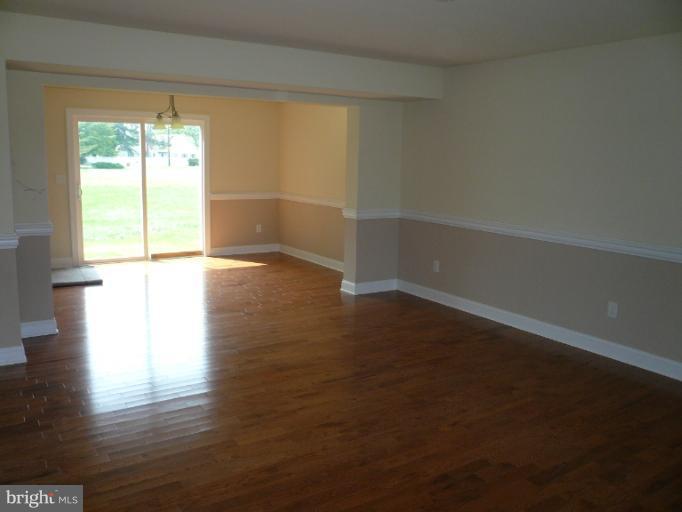 2717 Cox Neck Road Chester, MD 21619 - Photo 13 of 18 Family Room into Dining Room