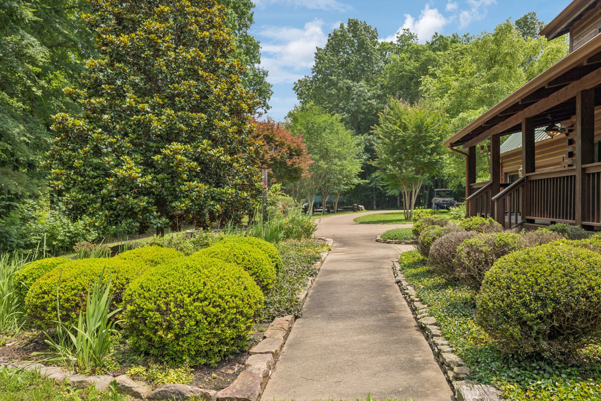 196 Moore Road Westpoint, TN 38486 - Photo 13 of 89 a view of a pathway with a garden