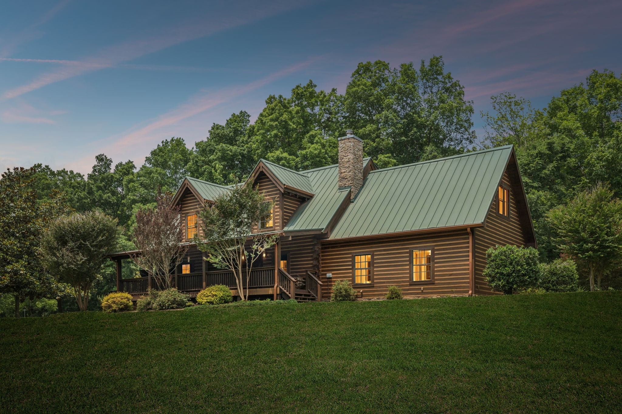 196 Moore Road Westpoint, TN 38486 - Photo 2 of 89 a front view of a house with a garden