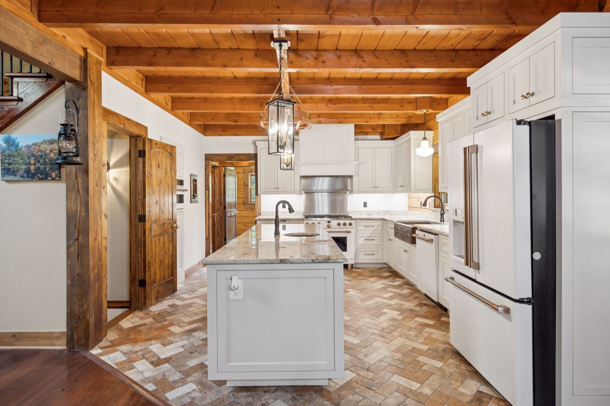 196 Moore Road Westpoint, TN 38486 - Photo 25 of 89 a kitchen with refrigerator and cabinets