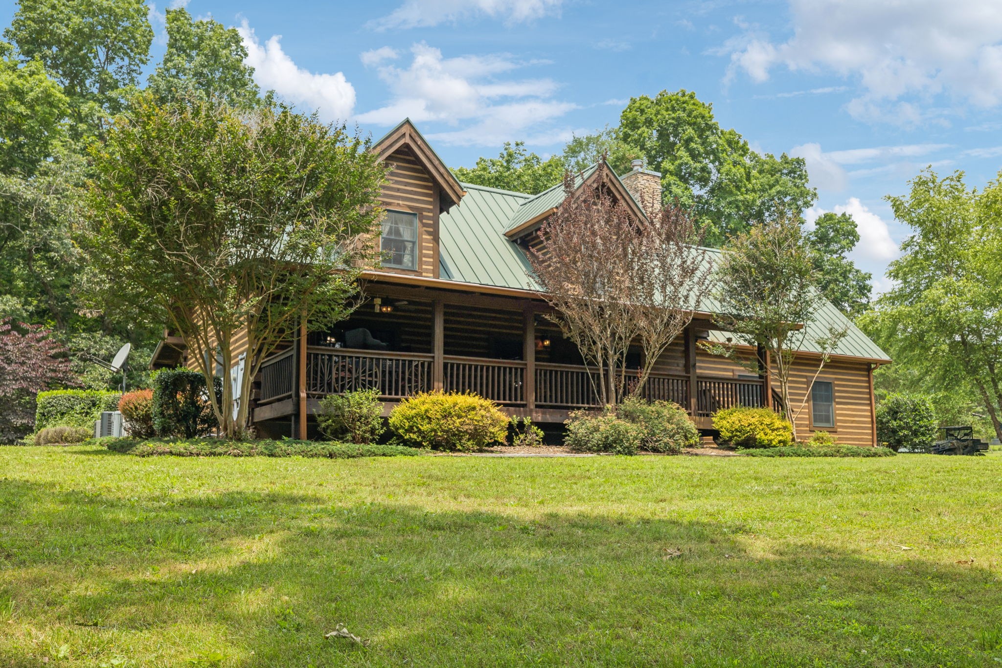 196 Moore Road Westpoint, TN 38486 - Photo 3 of 89 a front view of a house with garden