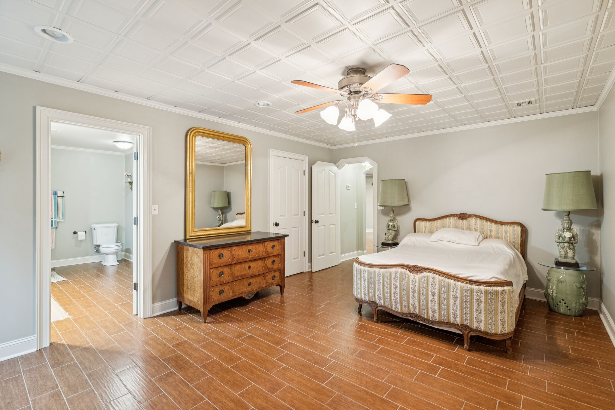 196 Moore Road Westpoint, TN 38486 - Photo 42 of 89 a bedroom with a bed and a chandelier