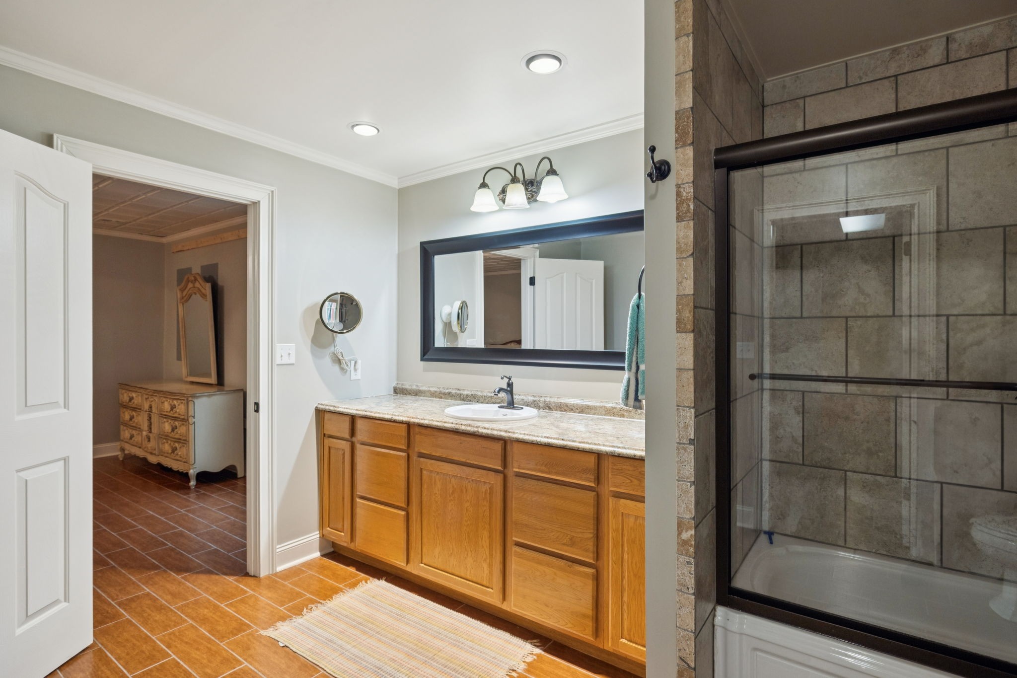 196 Moore Road Westpoint, TN 38486 - Photo 44 of 89 a bathroom with a granite countertop sink and a mirror