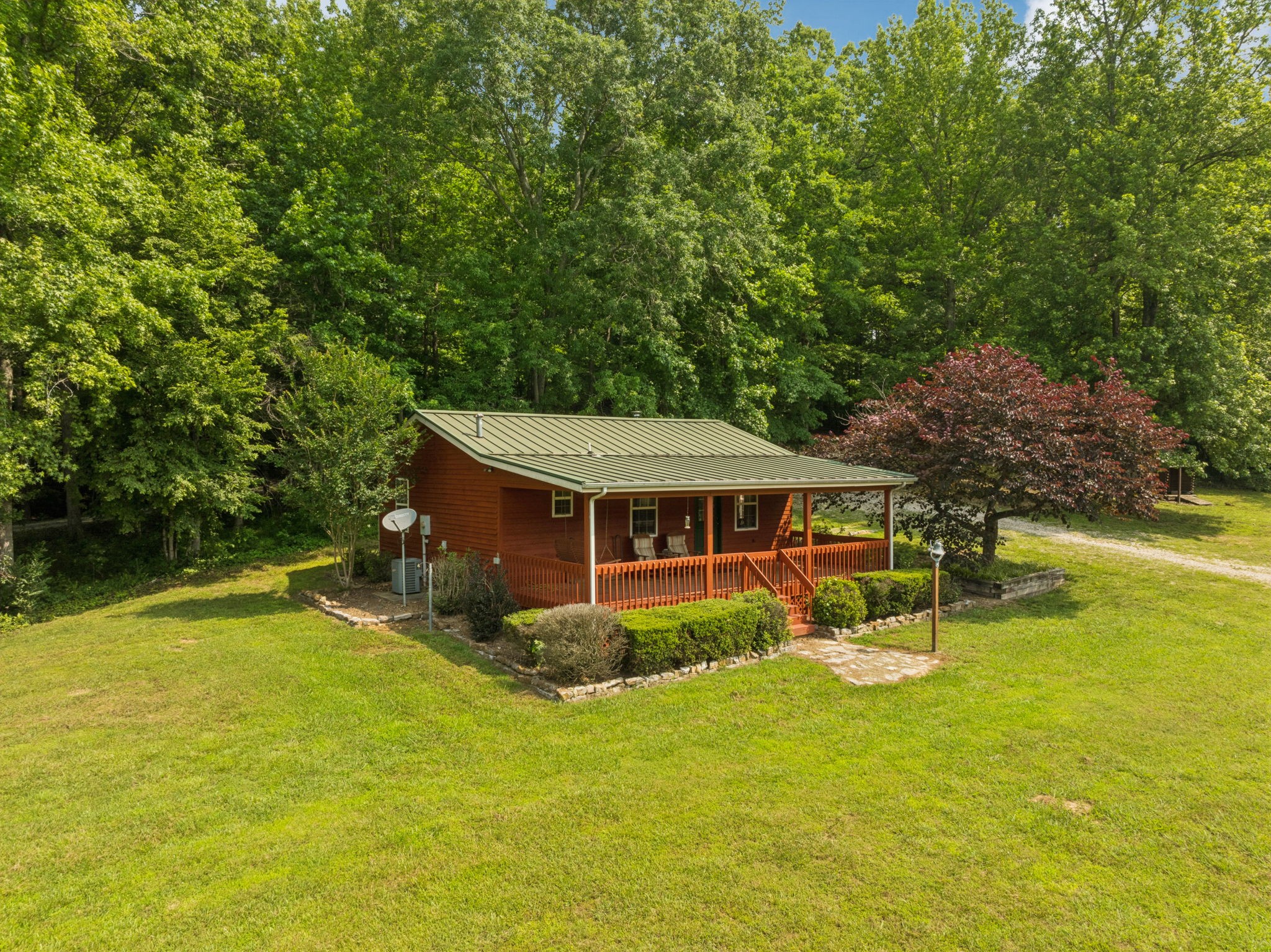 196 Moore Road Westpoint, TN 38486 - Photo 50 of 89 a view of a house with pool and a yard