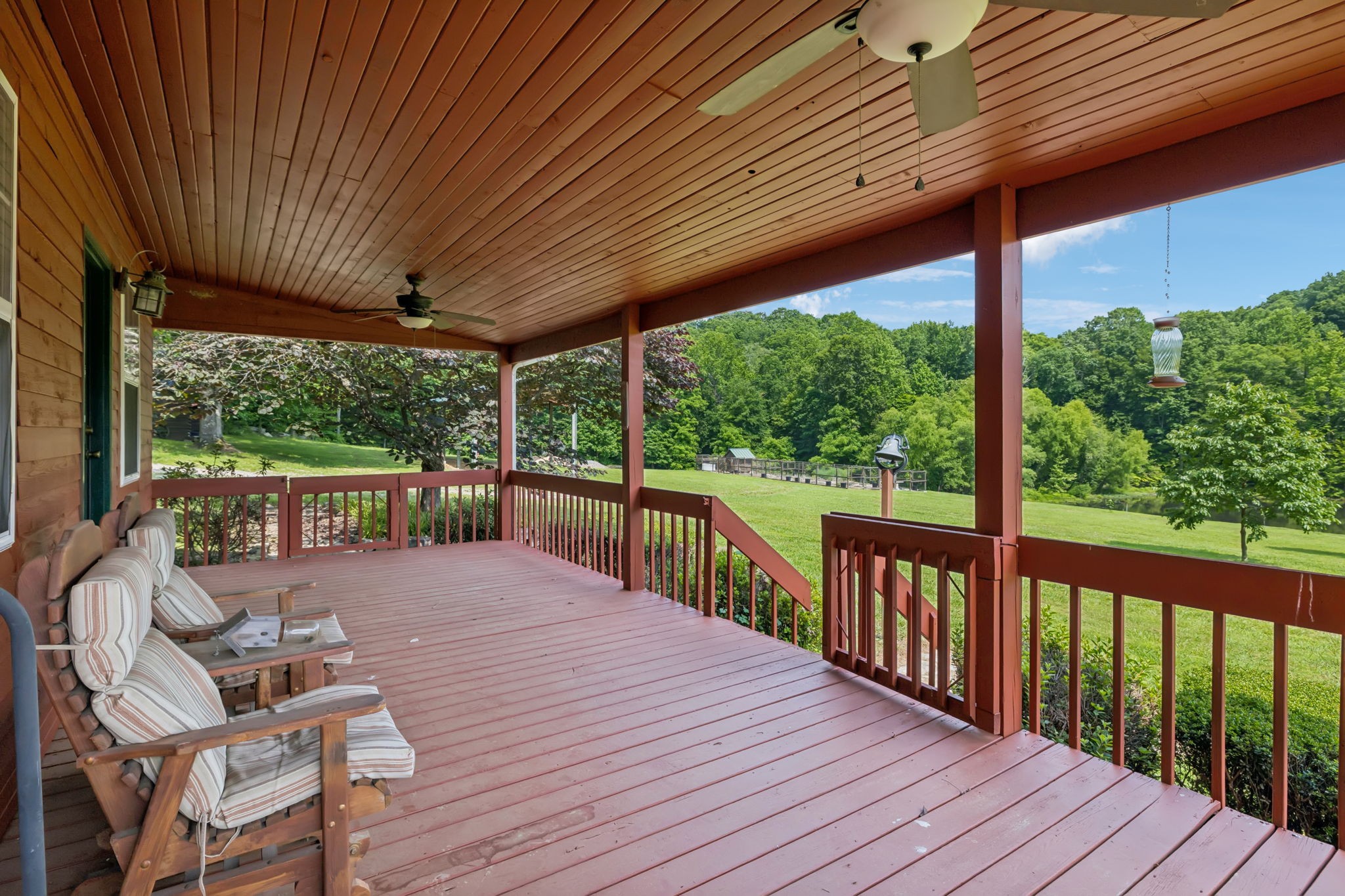 196 Moore Road Westpoint, TN 38486 - Photo 51 of 89 a balcony with wooden floor and outdoor space