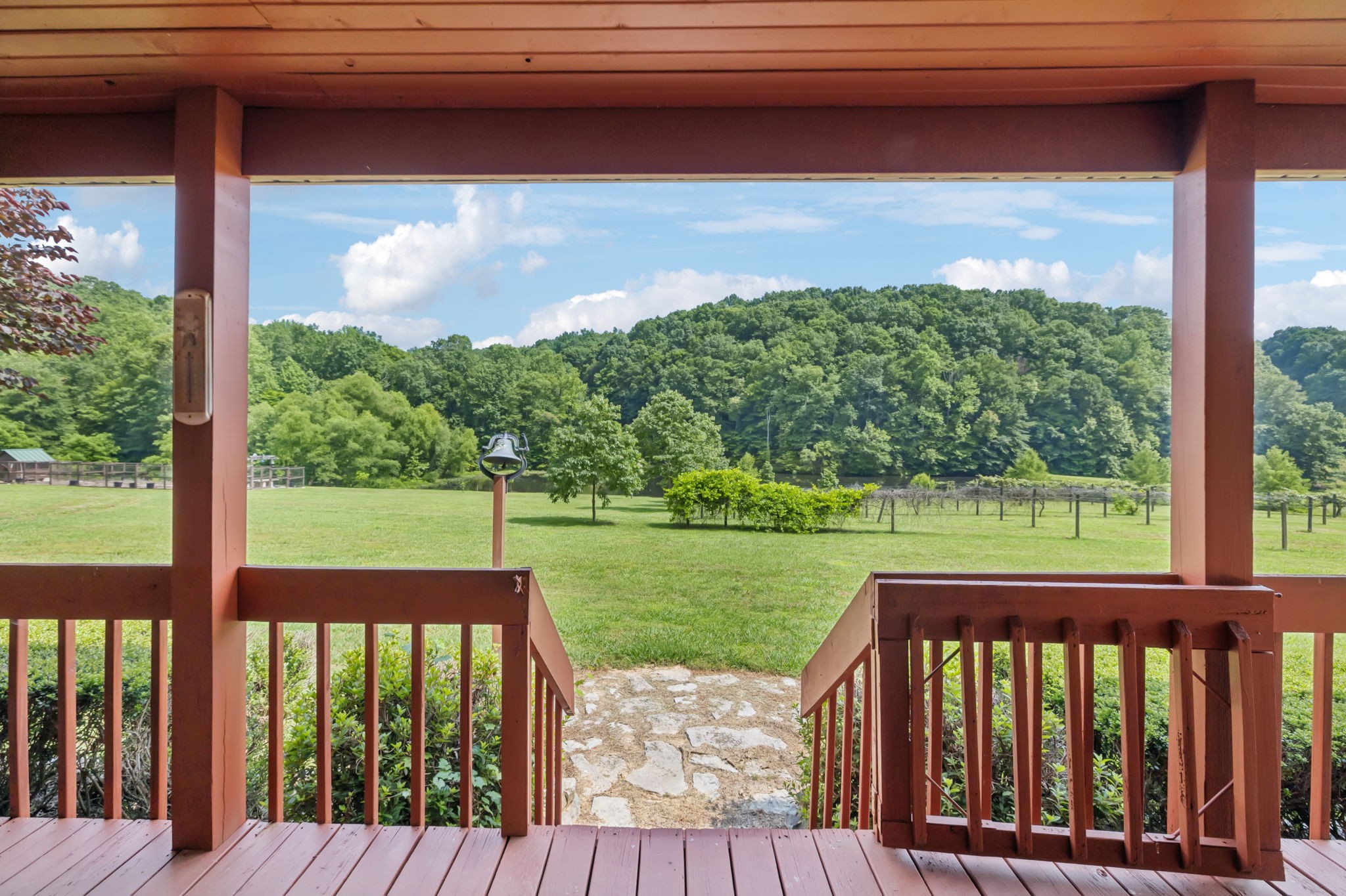 196 Moore Road Westpoint, TN 38486 - Photo 52 of 89 a view of a wooden deck with a yard
