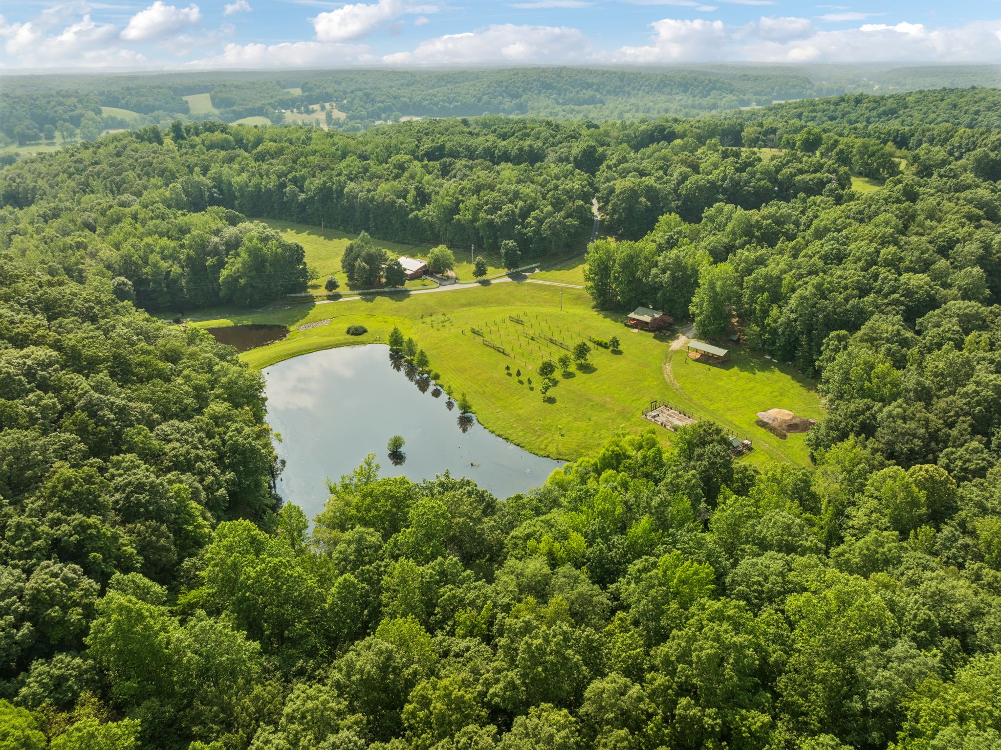 196 Moore Road Westpoint, TN 38486 - Photo 74 of 89 an aerial view of a house with a yard and lake view