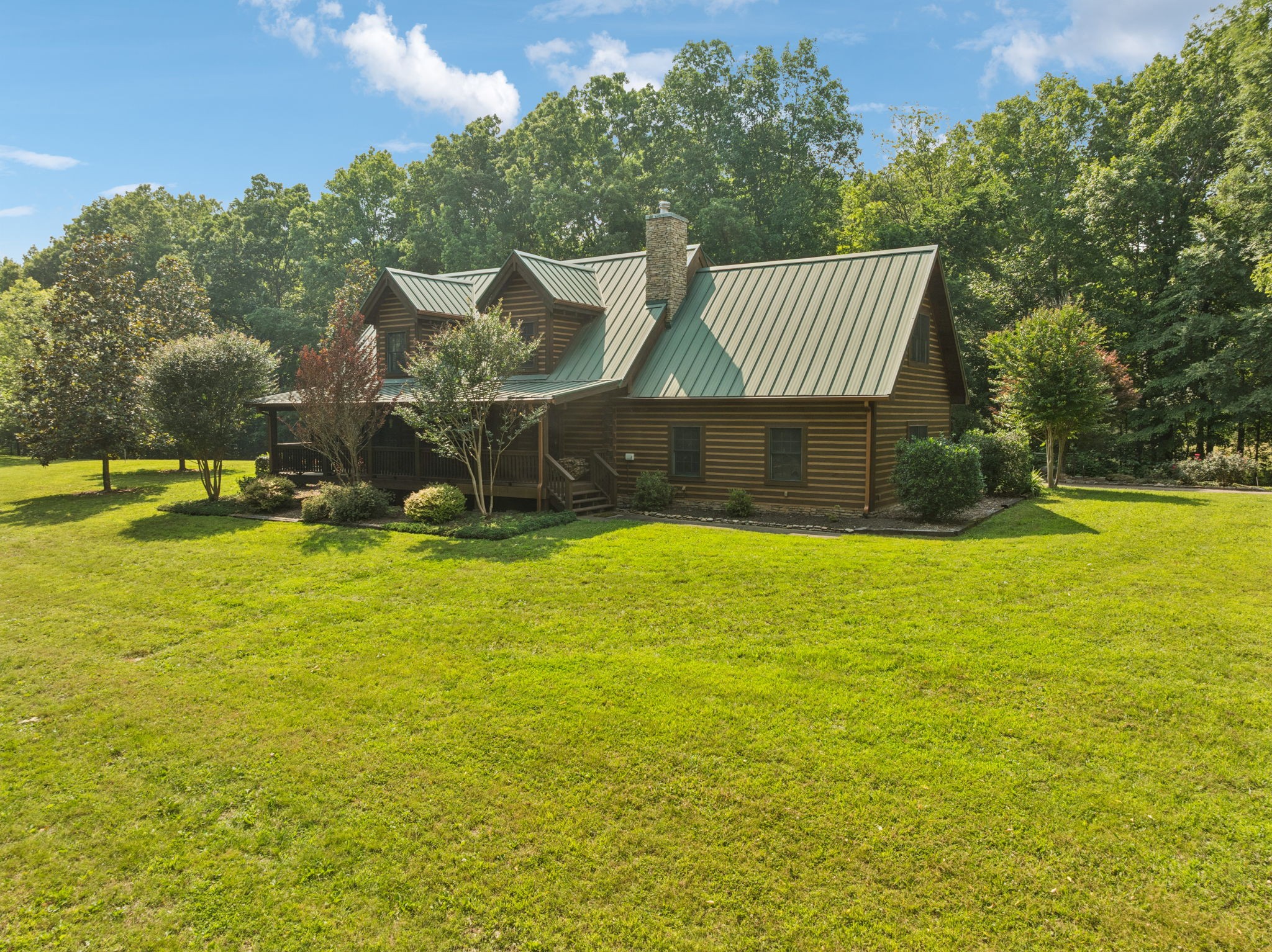 196 Moore Road Westpoint, TN 38486 - Photo 10 of 89 a front view of a house with a yard