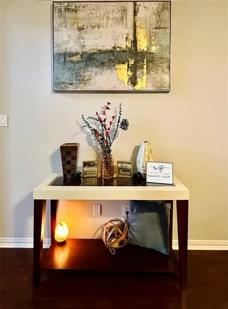 a view of table with chair and wooden floor