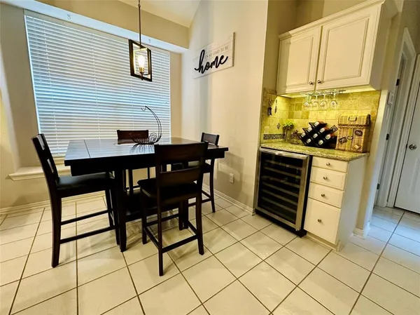 a dining room with furniture and a table