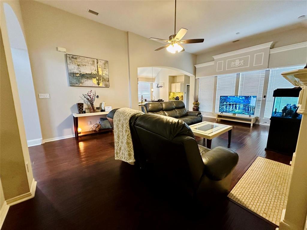 3607 Sable Ridge Drive Dallas, TX 75287 - Photo 4 of 30 a living room with fireplace furniture and a wooden floor