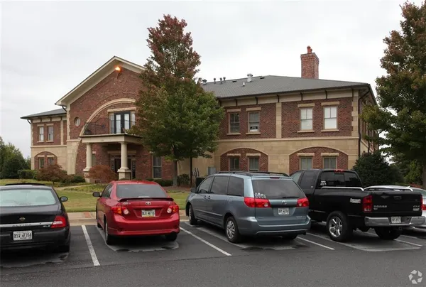 a car parked in front of a house