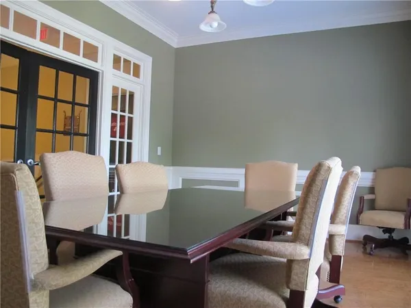 a view of a workspace with furniture