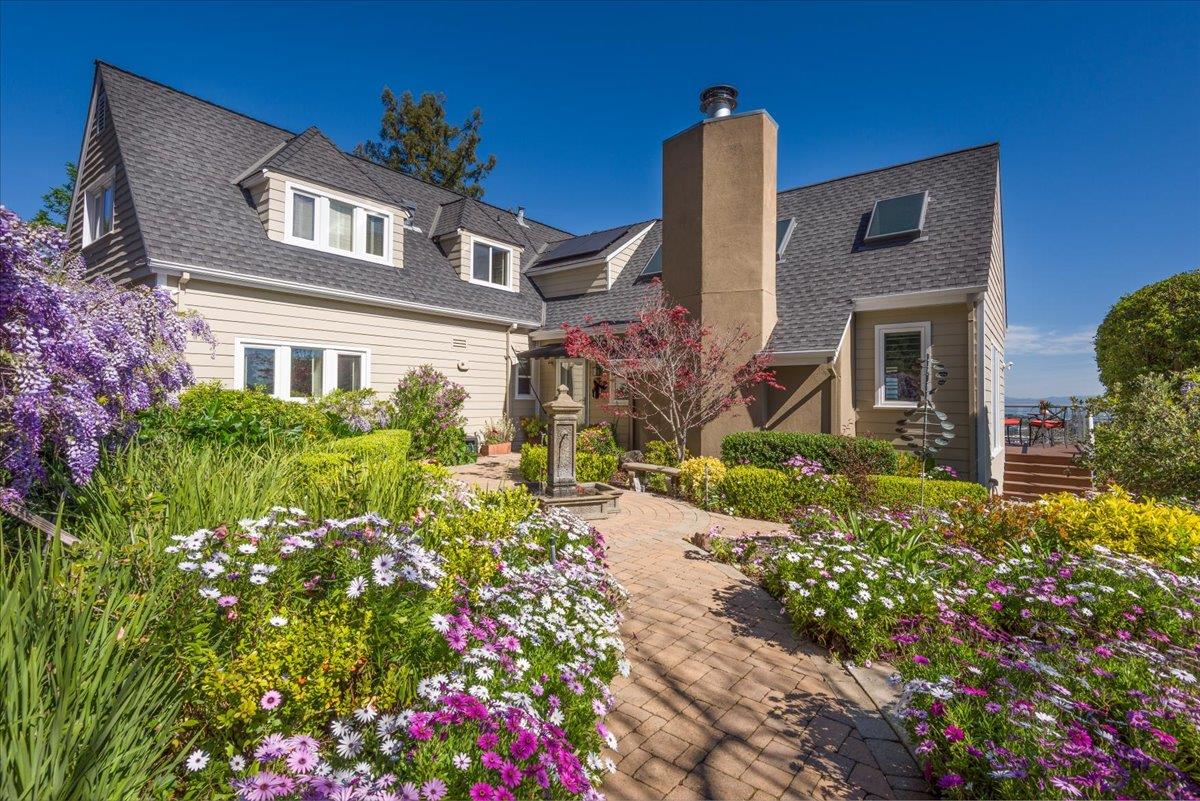 819 Holly Road Belmont, CA 94002 - Photo 12 of 75 a front view of a house with a yard