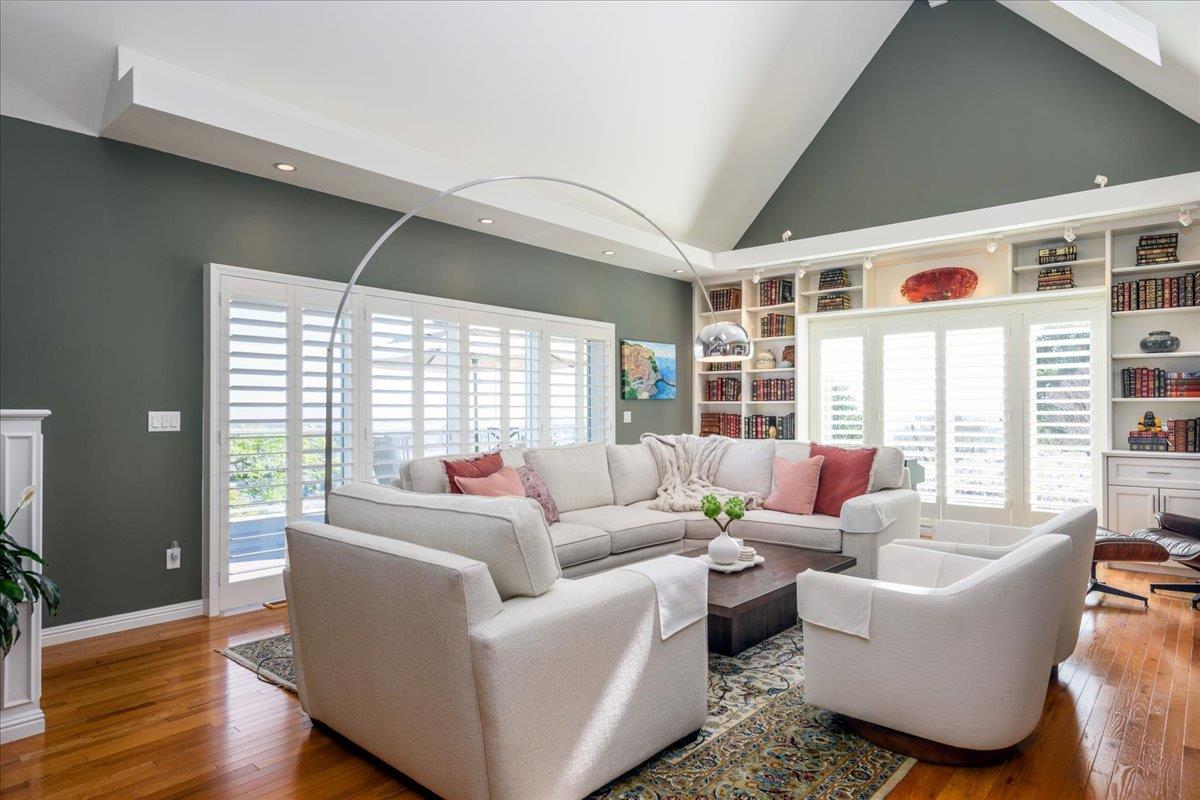 819 Holly Road Belmont, CA 94002 - Photo 18 of 75 a living room with furniture and a large window