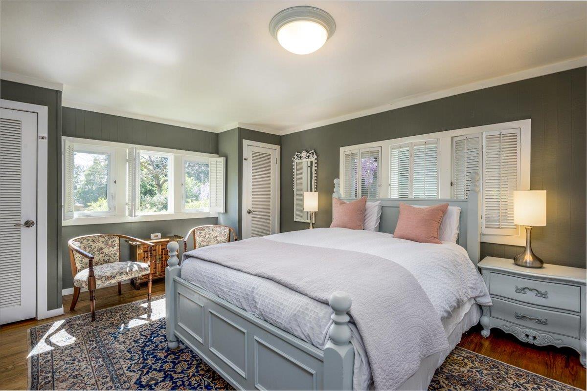 819 Holly Road Belmont, CA 94002 - Photo 30 of 75 a bedroom with a bed and a window