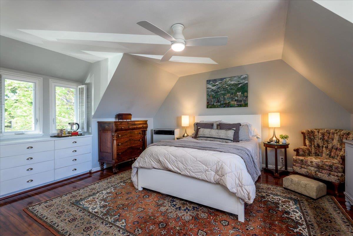 819 Holly Road Belmont, CA 94002 - Photo 32 of 75 a spacious bedroom with a bed and a dresser