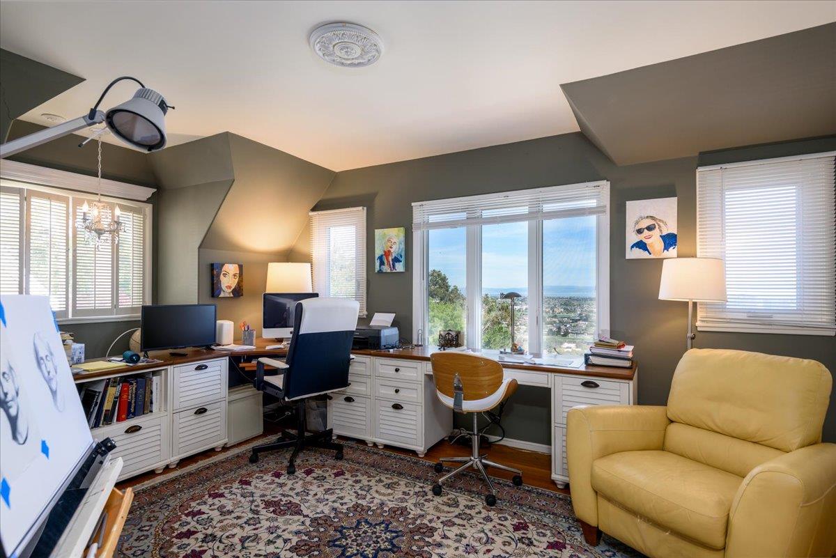 819 Holly Road Belmont, CA 94002 - Photo 35 of 75 a living room with furniture and a window
