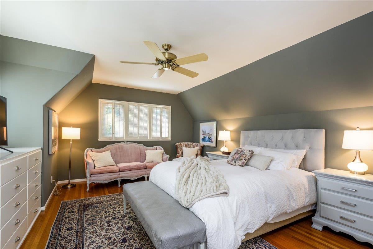 819 Holly Road Belmont, CA 94002 - Photo 36 of 75 a bed room with a bed and a couch