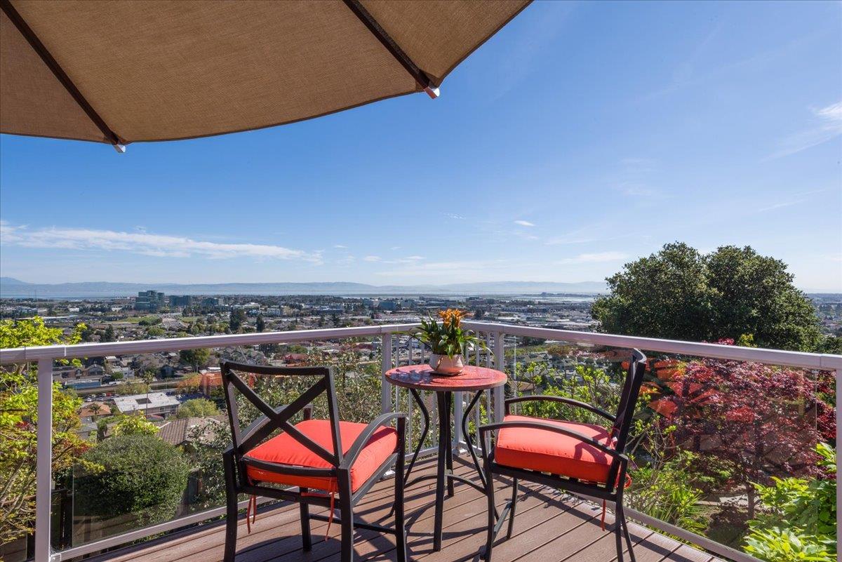 819 Holly Road Belmont, CA 94002 - Photo 39 of 75 a view of a chairs and table in patio